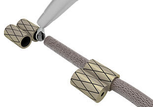 Adhesive being added to cord end